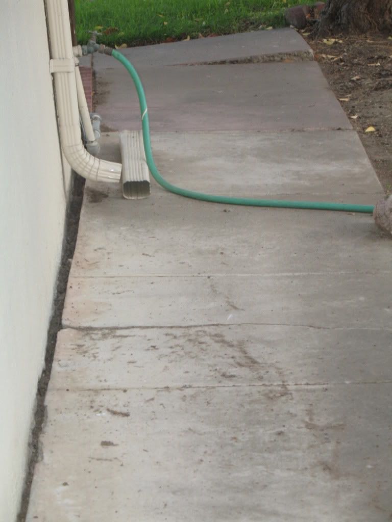 Need to fill a 3" Gap between Concrete Path and Side of House